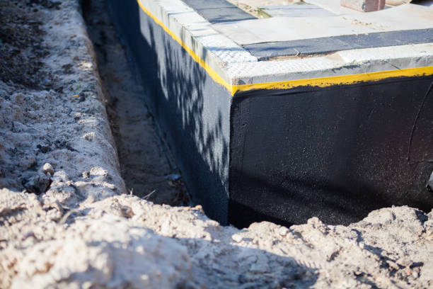 Professional Waterproofing technician working in Bushton, KS